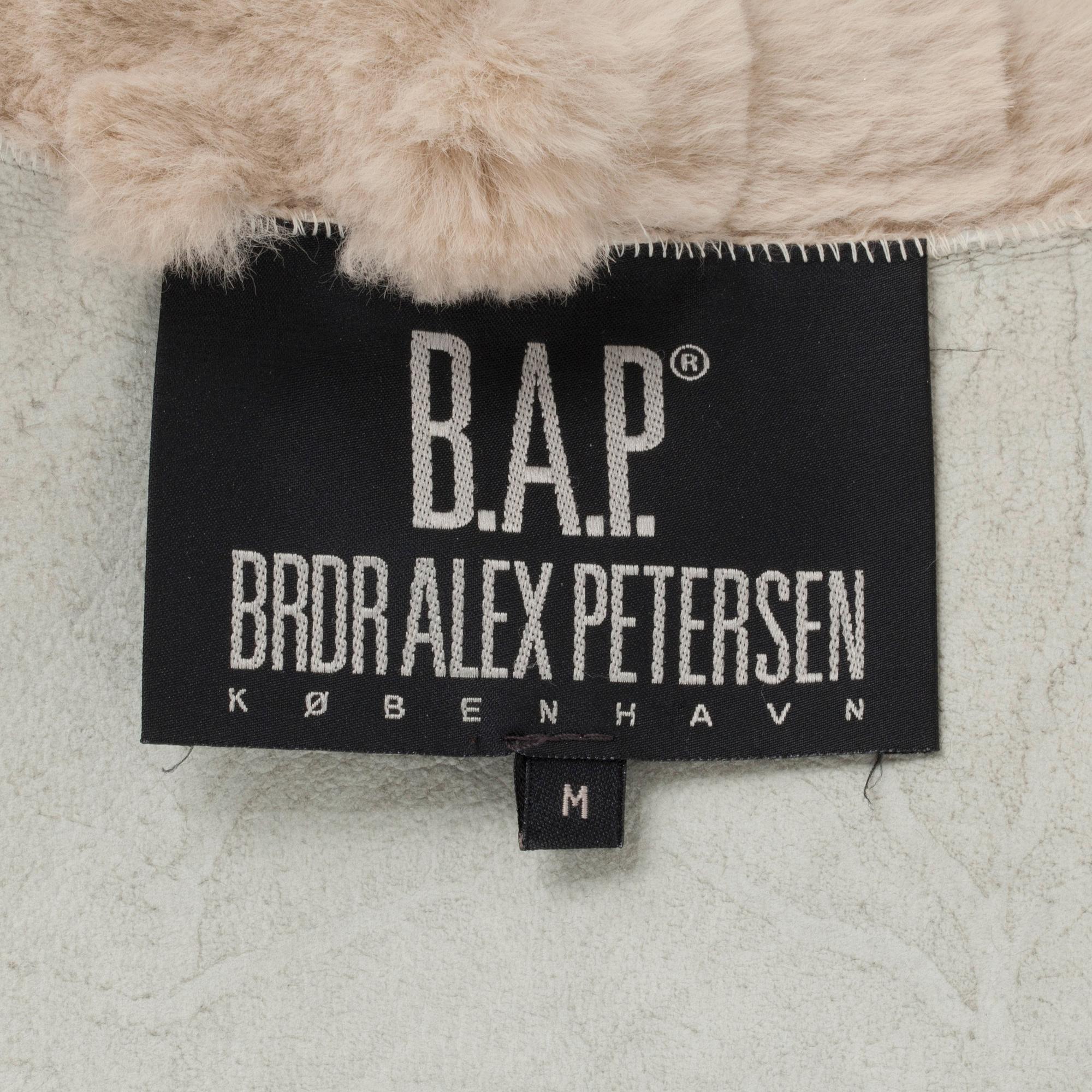 BROR AXEL PETERSEN, a beige rabbitfur coat. Size M.