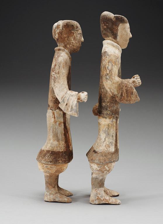 Two painted pottery figurines of standing soldiers, Han dynasty (206 BC- 220 AD).