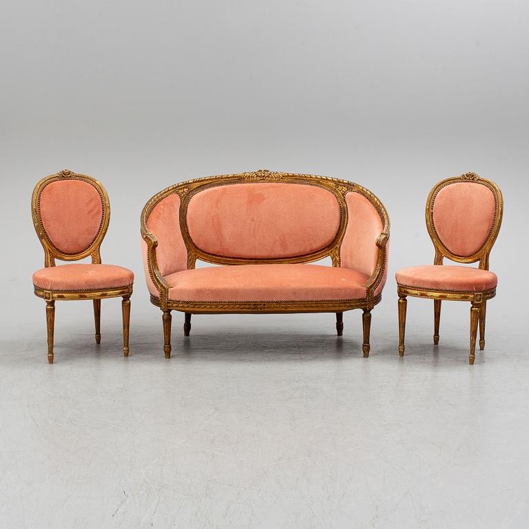 A sofa and a pair of chairs, Louis XVI-style, late 19th century.