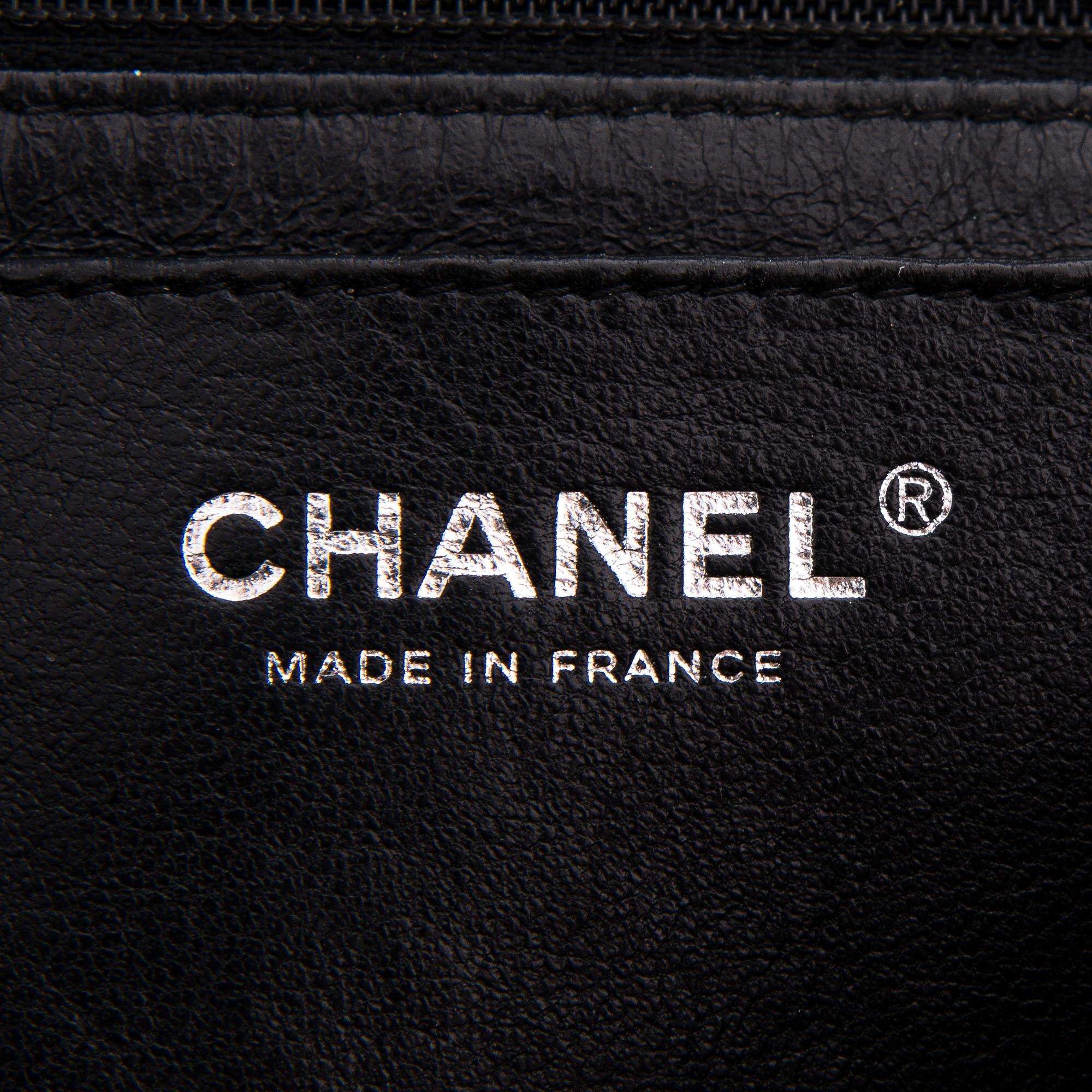 CHANEL Caviar Reissue 2.55 Jumbo Single Flap Bag.