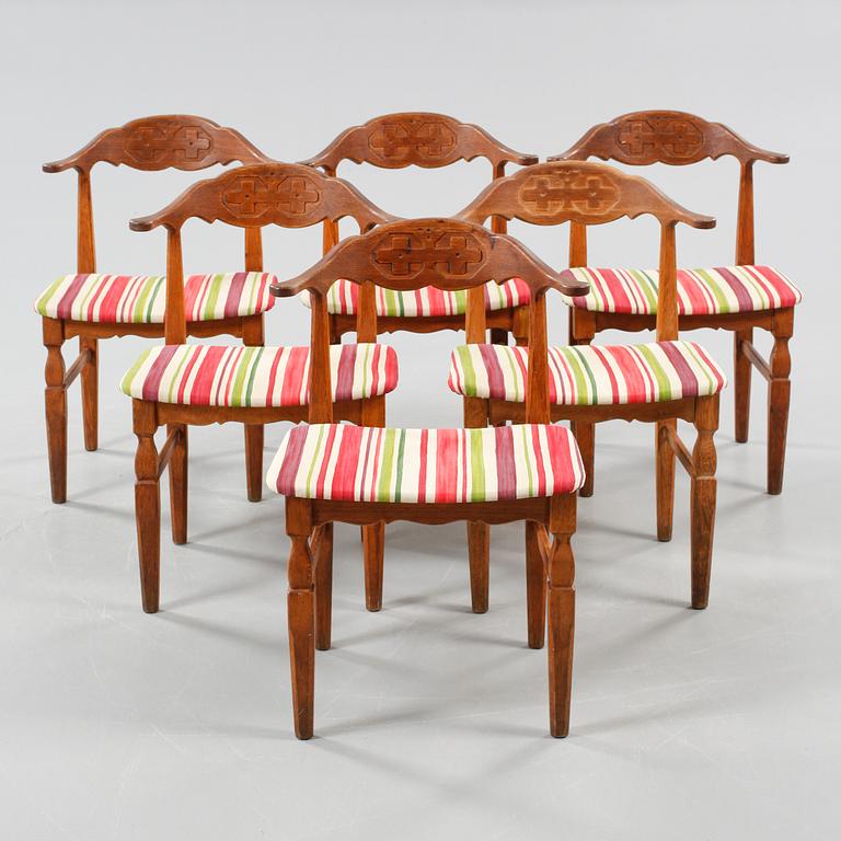 Six chairs designed by Henning Kjærnulf, made by EG Kvalitetsmøbler in the mid 20th century.