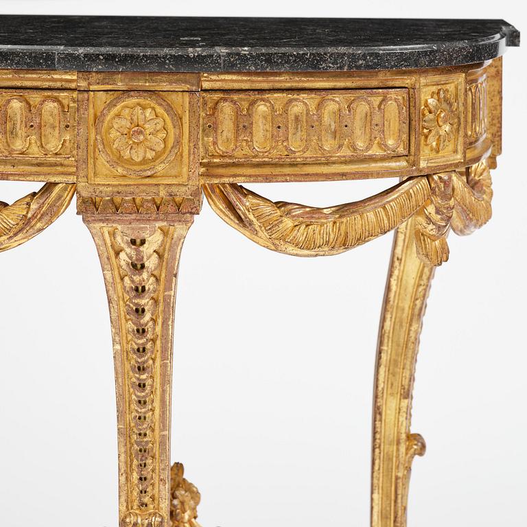 A Gustavian carved giltwood console table, Stockholm, late 18th century.