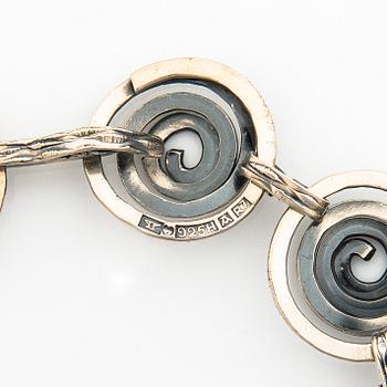 ELIS KAUPPI, RANNEKORU ja RIIPUS, stelringhopeaa, Kupittaan kulta, Turku 1970-71.