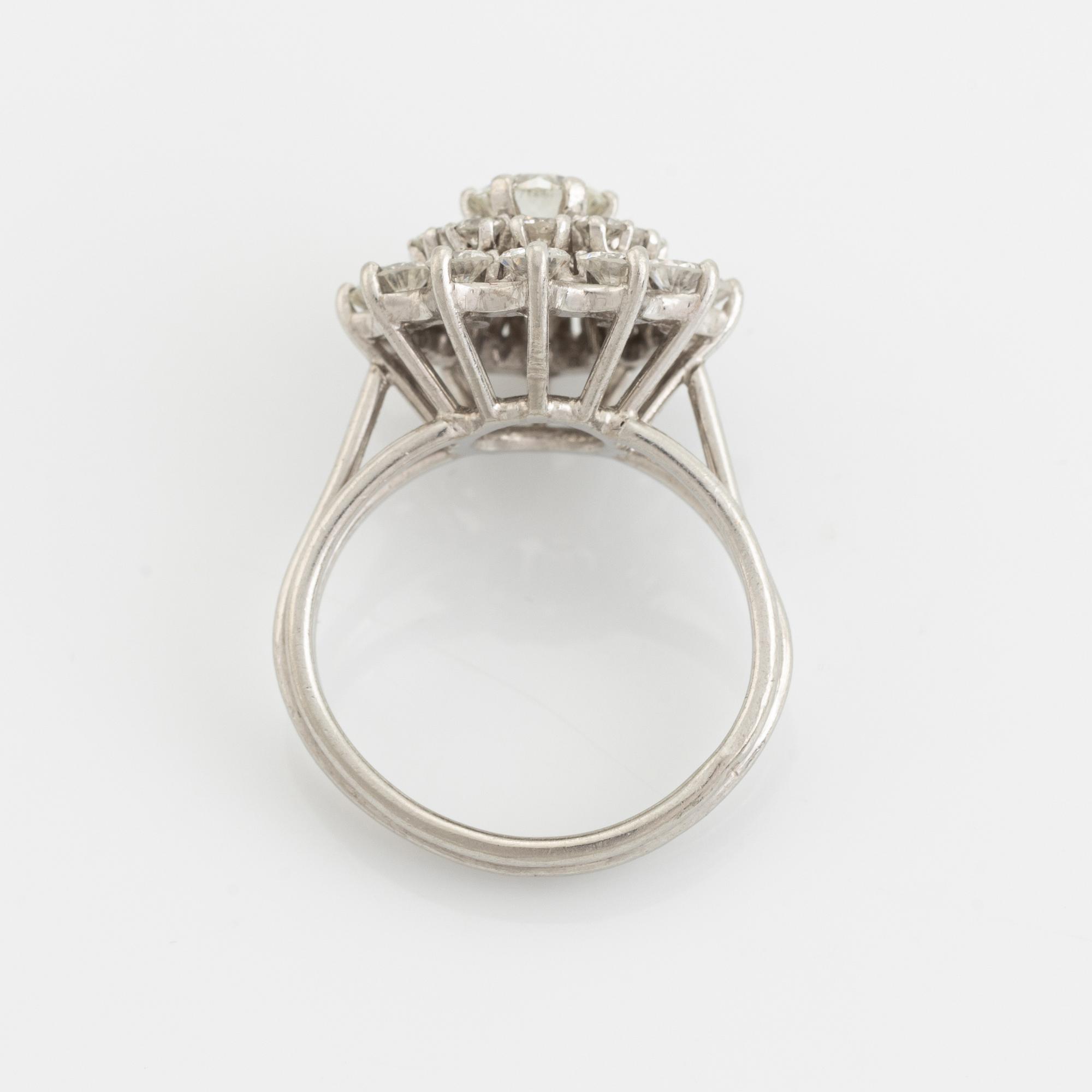 Brilliant cut diamond cluster ring.