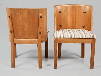 A set of eight Axel Einar Hjorth stained pine 'Lovö' chairs, Nordiska Kompaniet.