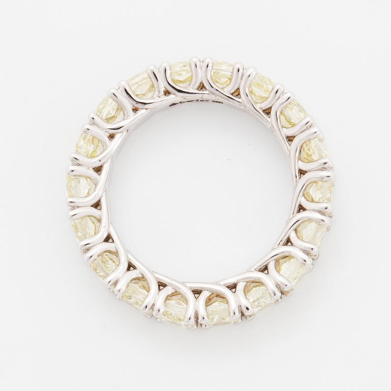 Cuschion-cut diamond eternity ring.