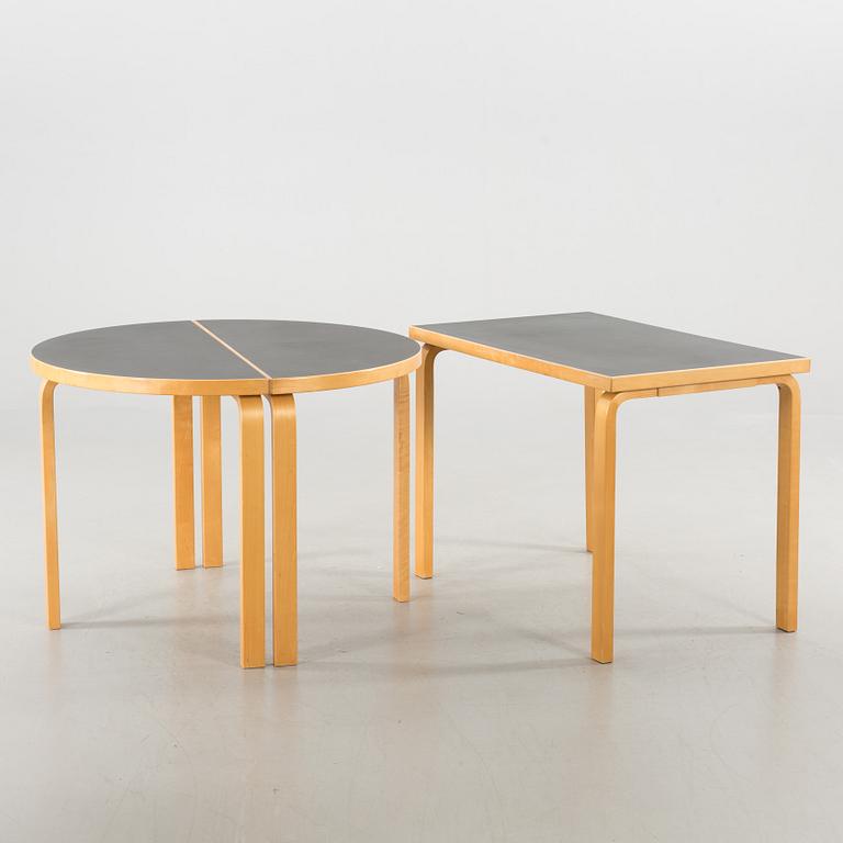 ALVAR AALTO, a 3 piece dining table.