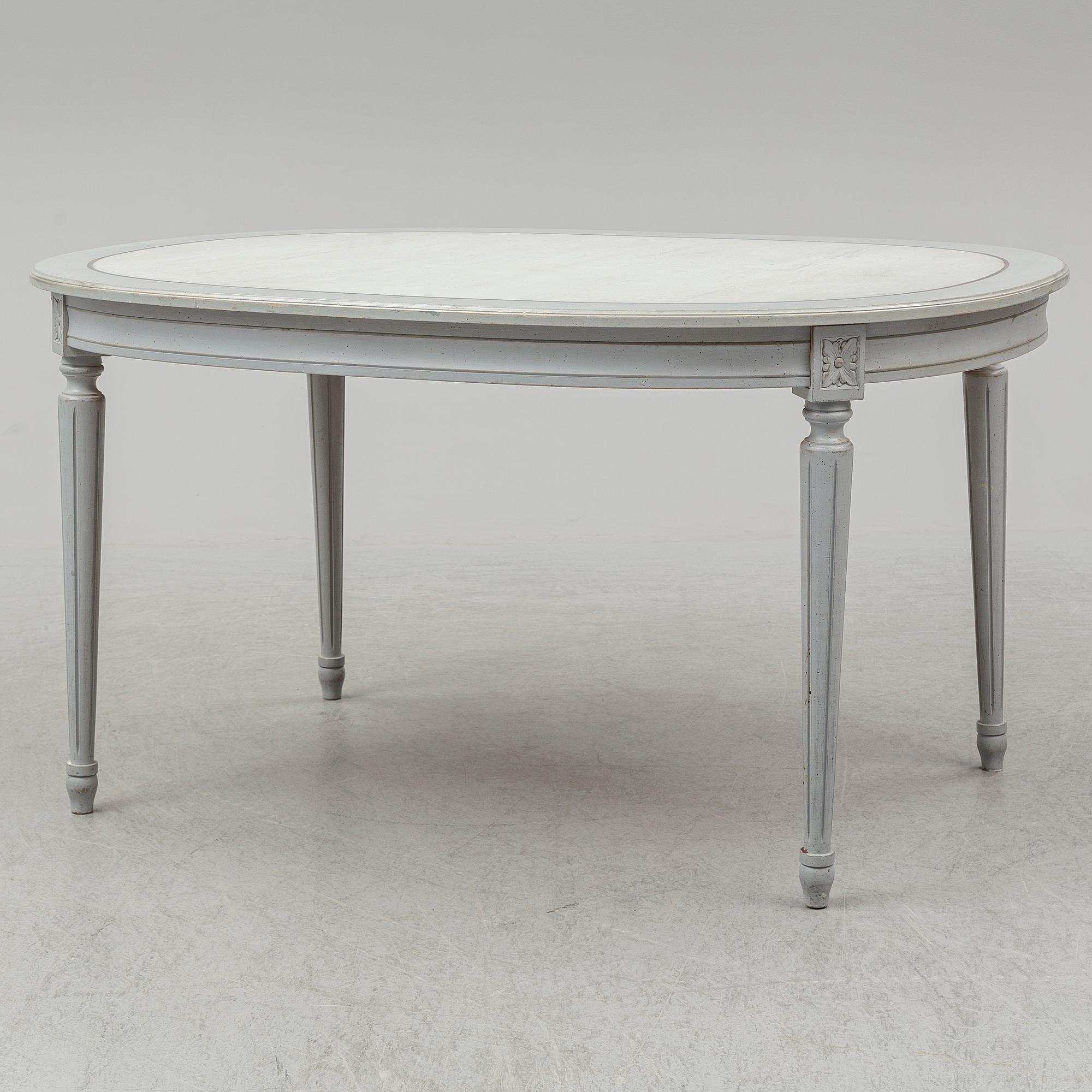 A dining table and four chairs, gustavian style, late 20th century.