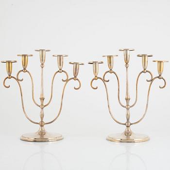 A pair of silver plated candelabra, mark of CG Hallberg, Stockholm.