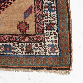 A runner carpet, possibly western Persia, c. 230 x 96 cm.