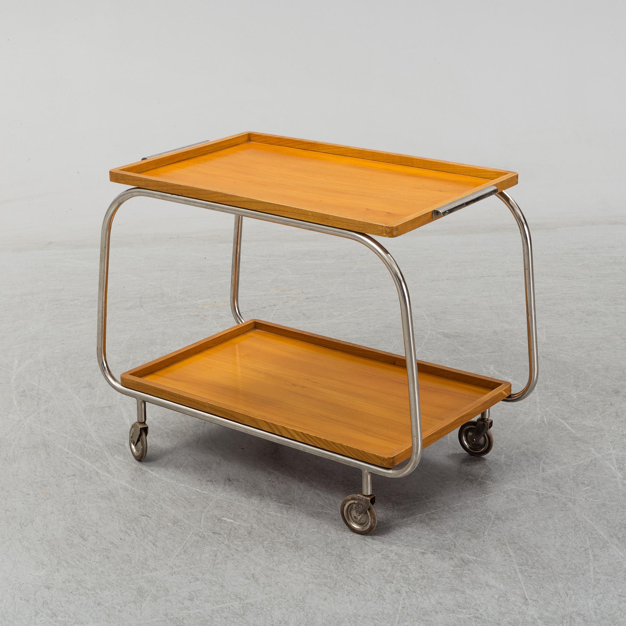 An elm and tubular steel drinks trolley, 1930's.