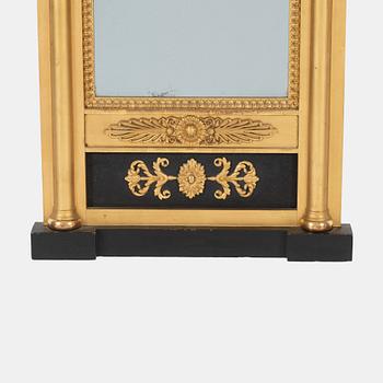 A Swedish Empire mirror, first half of the 19th Century.