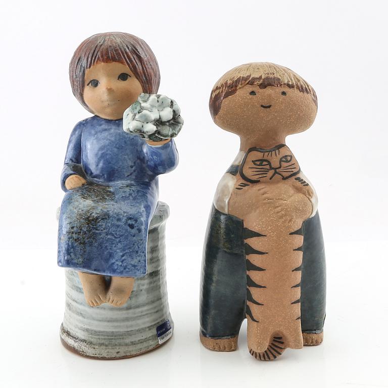 Lisa Larson, two figurines "Blomsterflicka" and "Pelle", Gustavsberg glazed stoneware.