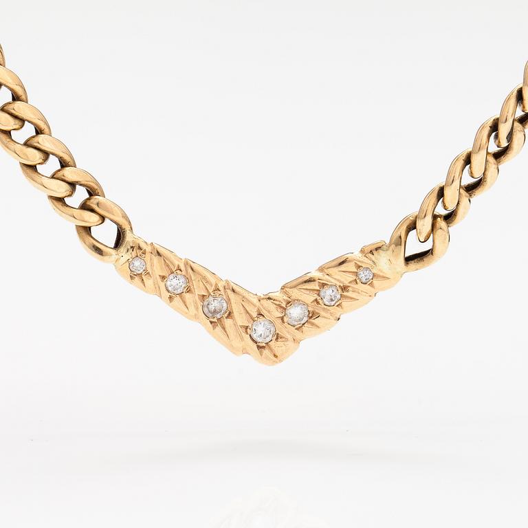 A 14K gold necklace with diamonds ca. 0.46 ct in total. With certificate.