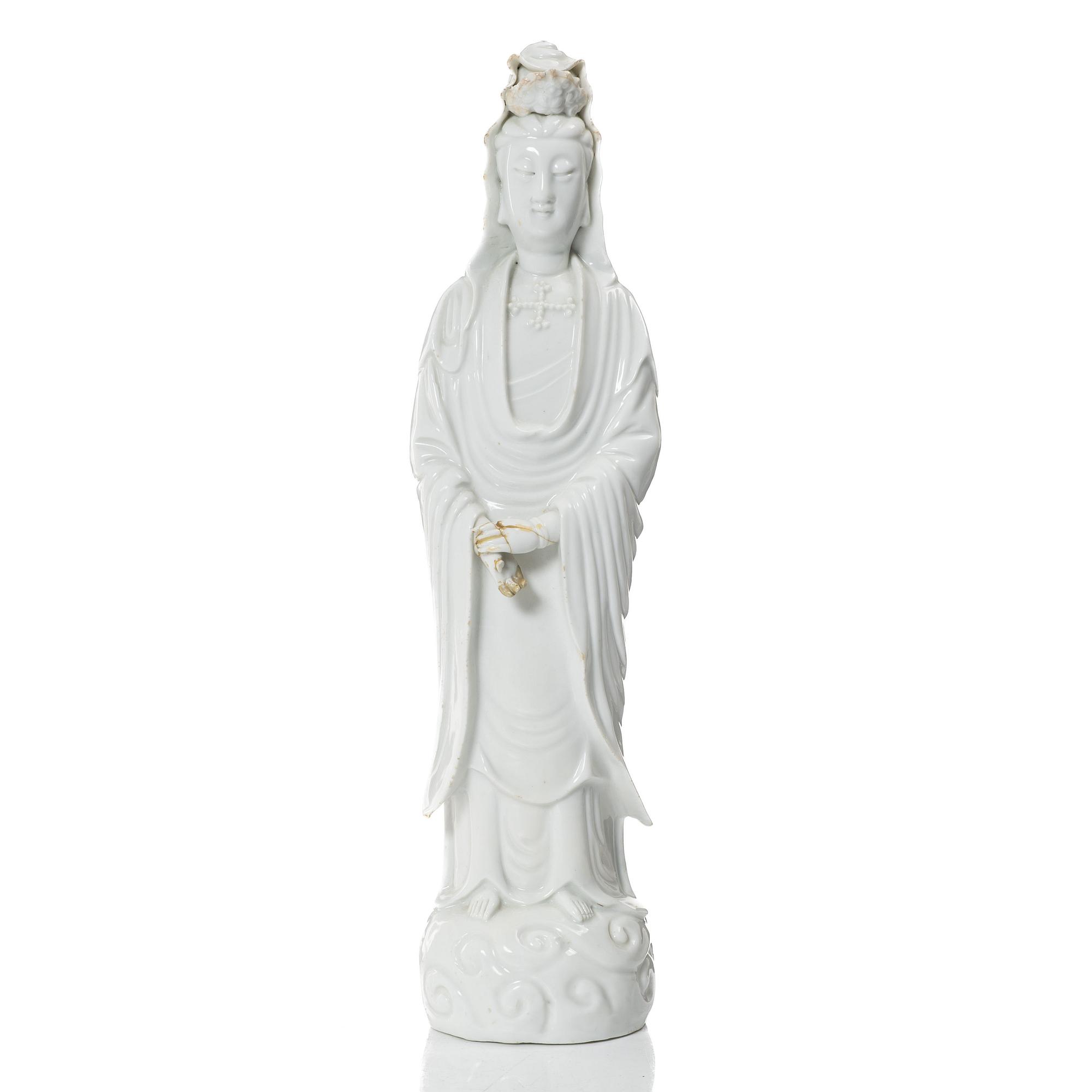 A Chinese blanc-de-Chine porcelain figure of Guanyin, Qing dynasty (1644-1912.