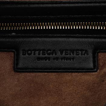 Bottega Veneta, a black leather bag.
