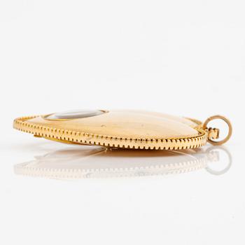 Heart locket, 18K gold with glass.