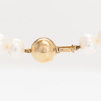 Helminauha, 14K kultalukko ja viljellyt makeanvedenhelmet.