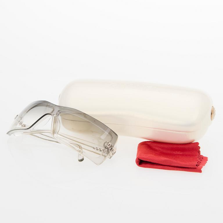 A Pair of Model 5067 Sunglasses.