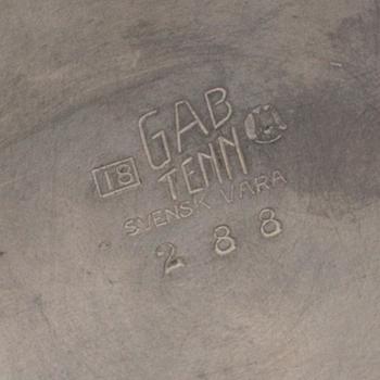 A tin winecooler by GAB, 1935.