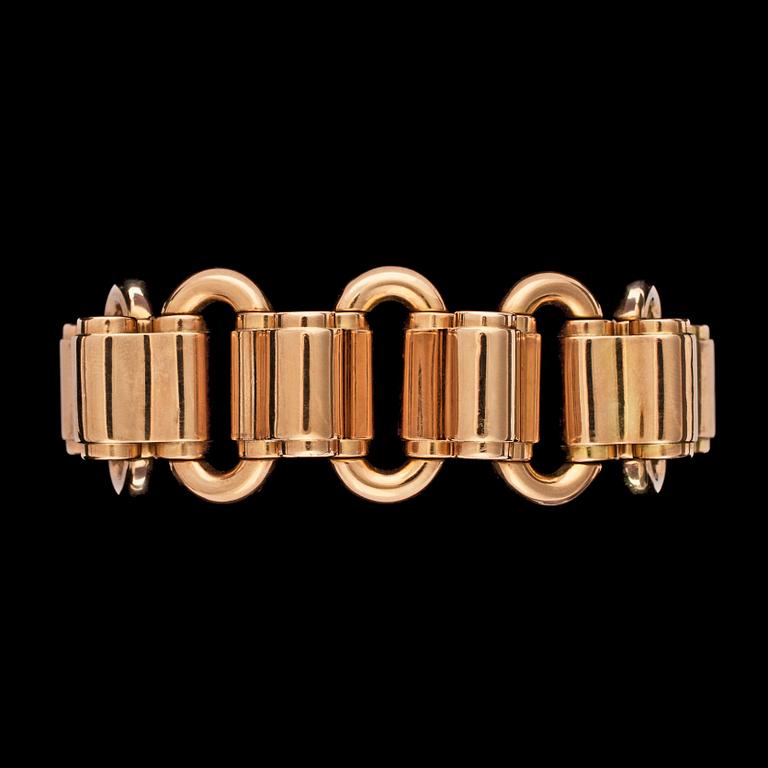 A gold bracelet, weight 83 g.