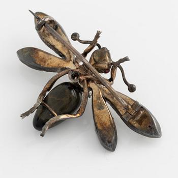 Brooch with white paste stones and tiger's eye.