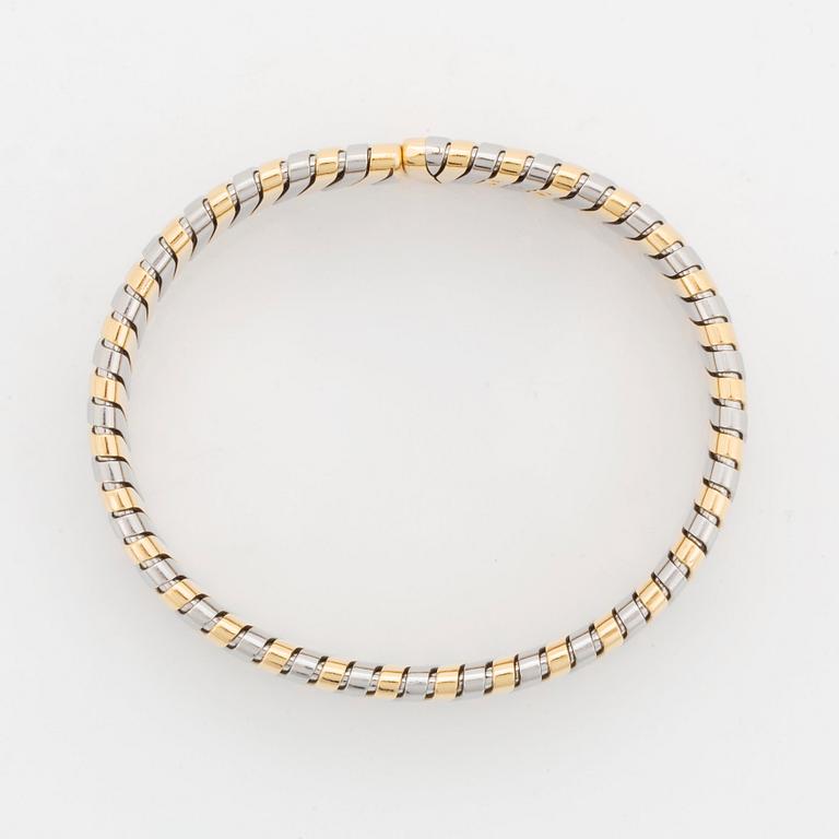 A Bulgari "Tubogas" bracelet in 18K gold and steel.