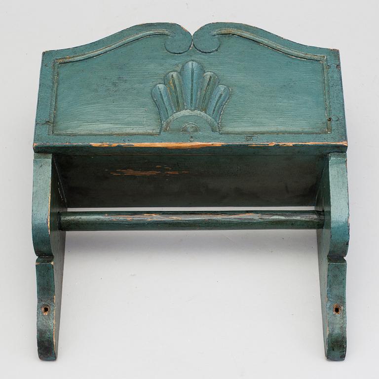 A carved and painted folk art towel rack 19th century.