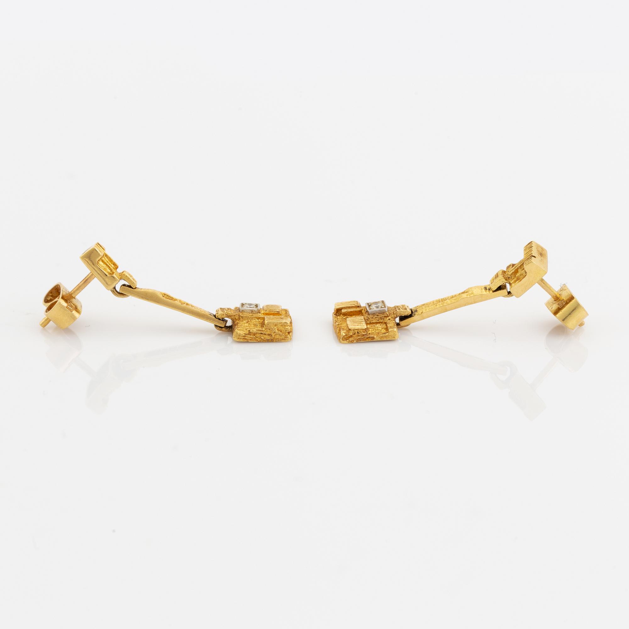 Björn Weckström, necklace and earrings,  18K gold with eight cut and brilliant cut diamonds.