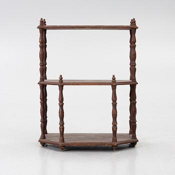 A wall shelf, 19th Century.