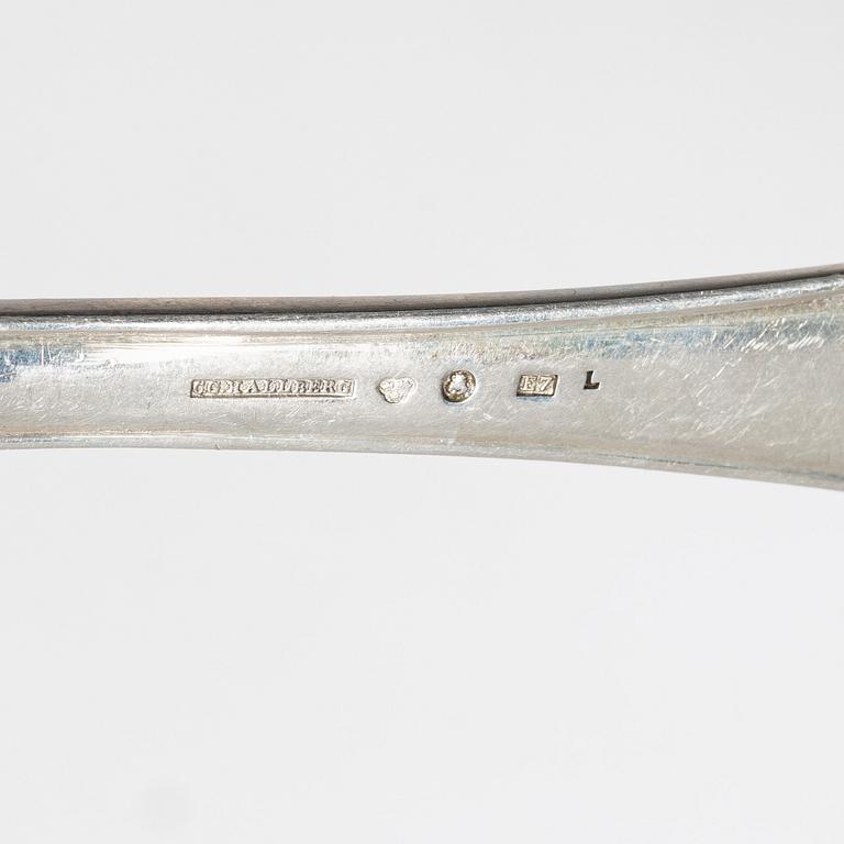 C.G. Hallberg, A 36 piece 'Svensk spets' cutlery service, Stockholm 1907.