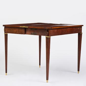 A Gustavian 'concertina action' mahogany games table by Georg Haupt (master in Stockholm 1770-84).