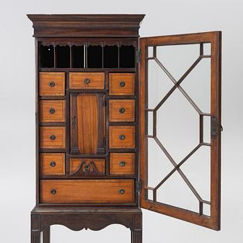 Display cabinet, likely England 19th century.