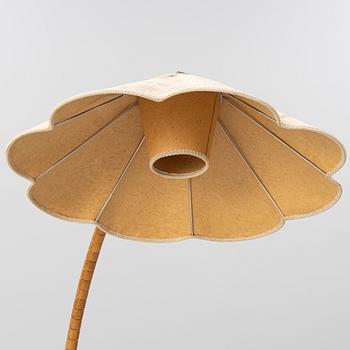 A 1930's/40's floor lamp with table.