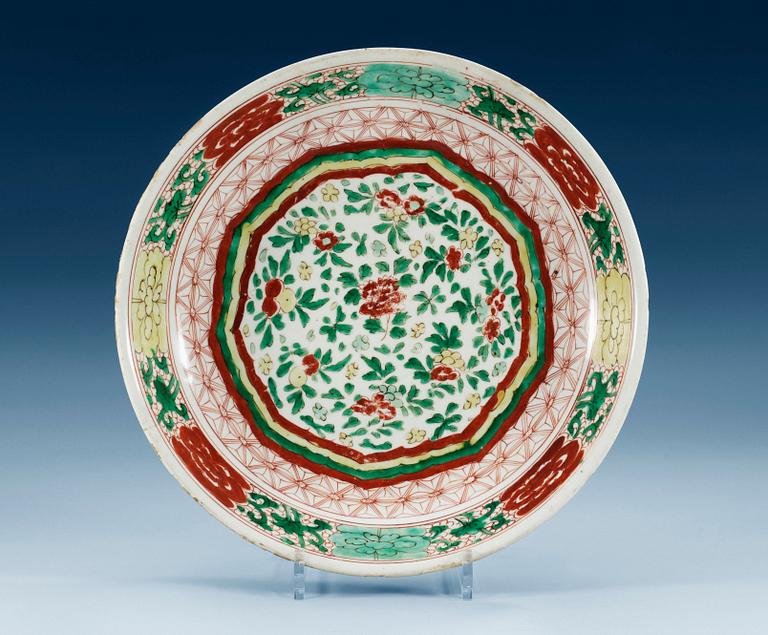 A sancai glazed charger, Qing dynasty, six characters mark and period of Kangxi (1662-1722).