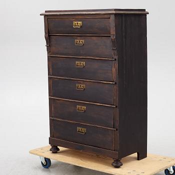 A chest of drawers, circa 1900.