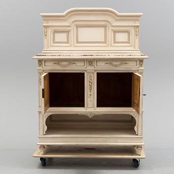 a Louis XVI-style sideboard from the 20th century.