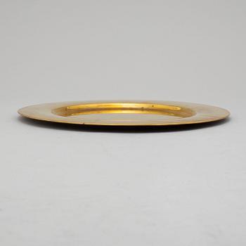 12 brass plates by Stelton, Denmark, second half of the 20th century.