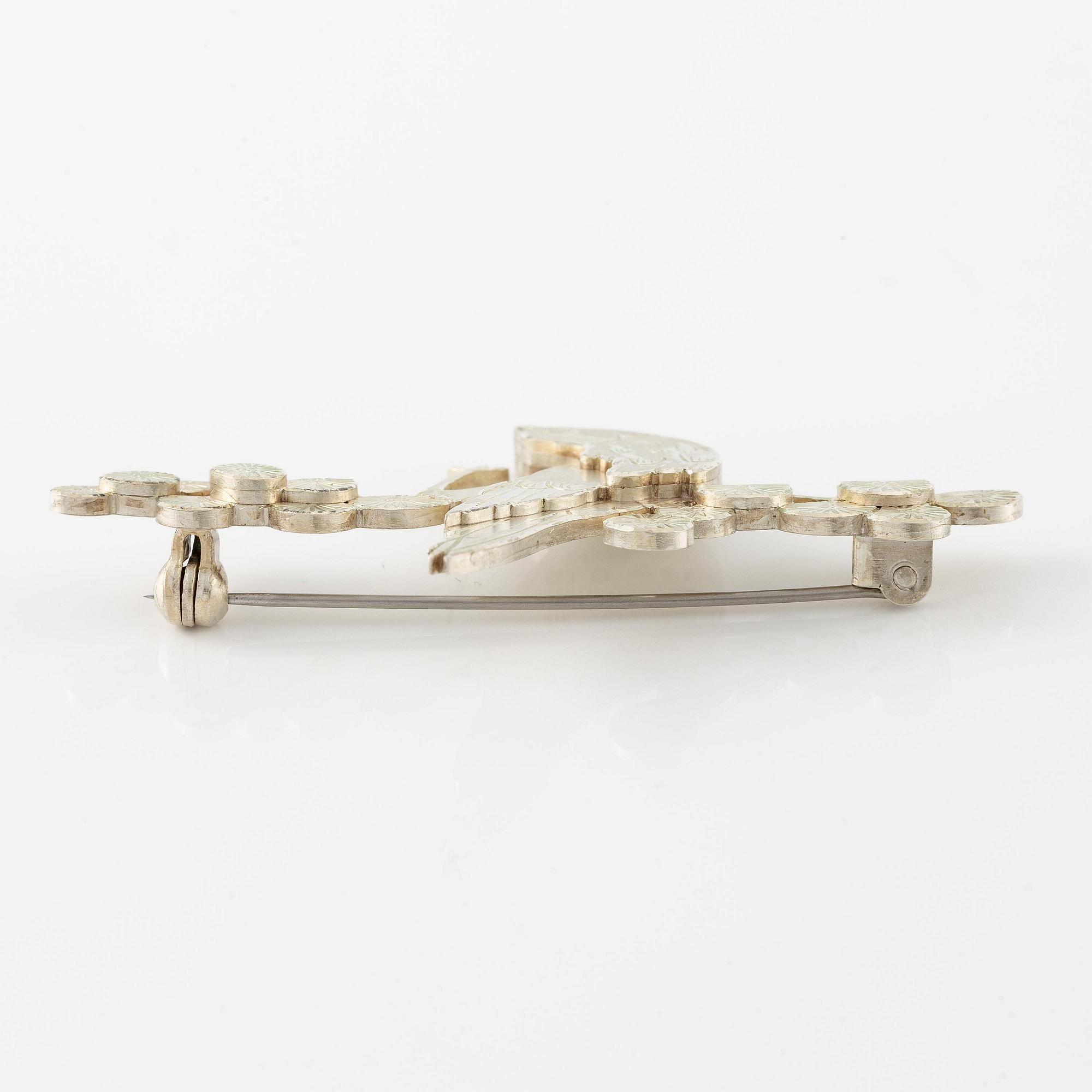 Wiwen Nilsson, a brooch in the form of a bird on a branch, sterling silver, Lund 1969.