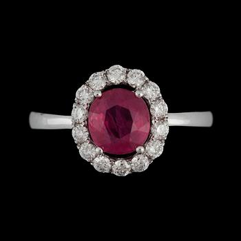 A 1.69 ct ruby and brilliant-cut diamond ring. Total carat weight on diamonds circa 0.51 ct. Quality G-H/VS.