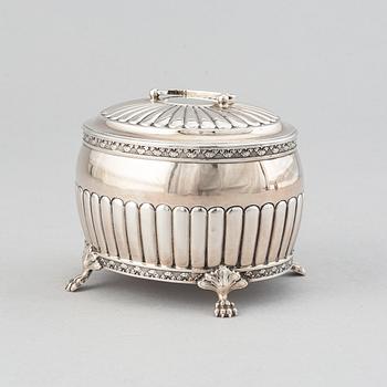 A silver creamer by Johan Petter Ahlforss, Strängnäs, 1833 and a silver sugar box, Kristianstad, 1928.