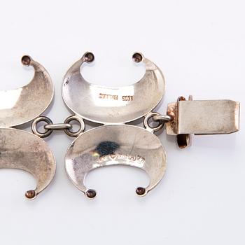 A four piece sterling silver jewellry set, Kultateollisuus Ky Viljanen, Turku, 1977.