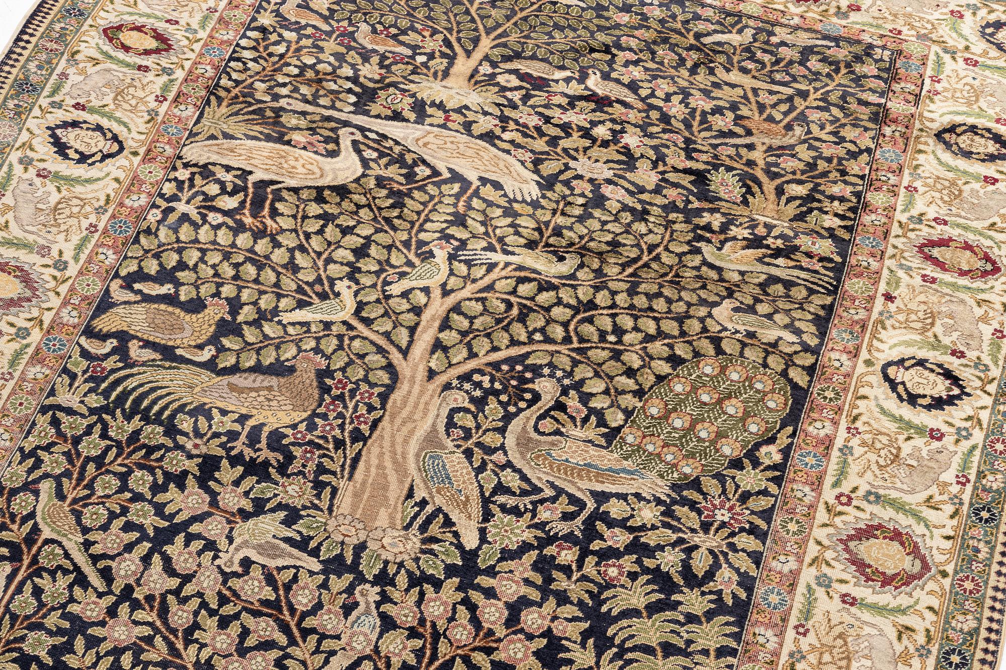 An antique silk Paderma/Kayseri rug, c. 217 x 153 cm.