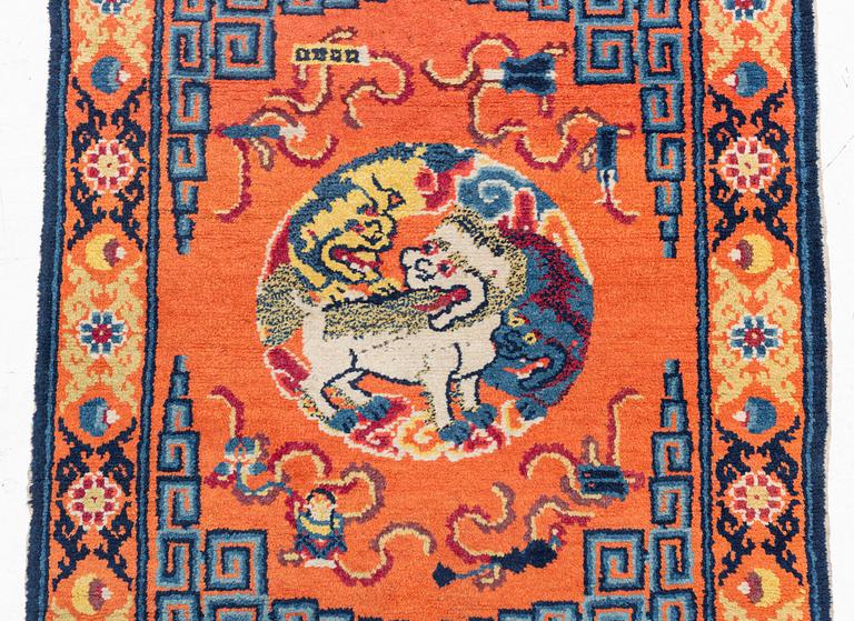 An antique Ningxia runner, north west China, c 763 x 72 cm.