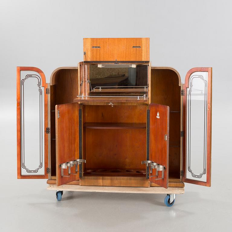 A 1960s "Mayfair" cocktail cabinet by Rivington, England.