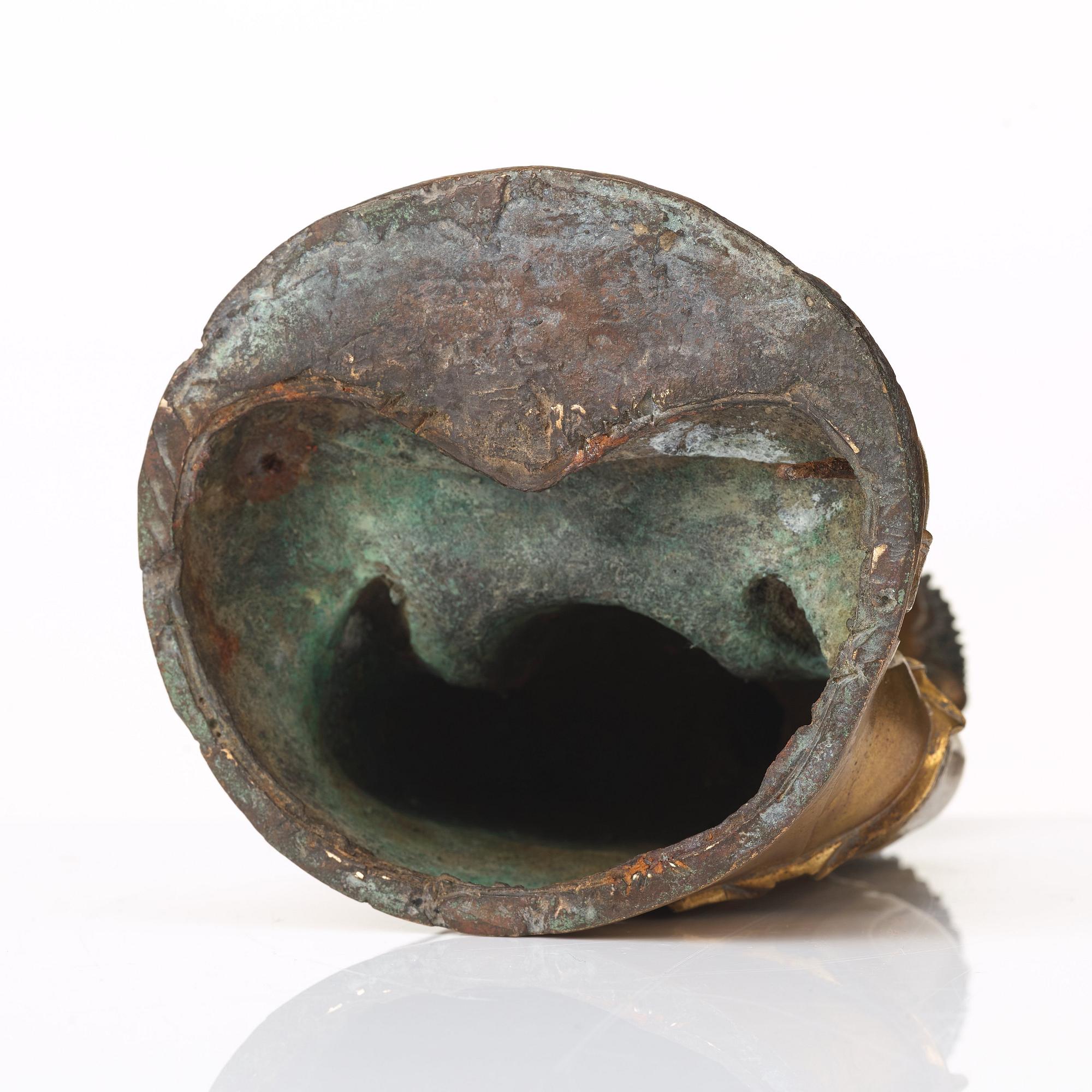 A gilt bronze figure of Amithaba Buddha, Ming dynasty (1368-1644).