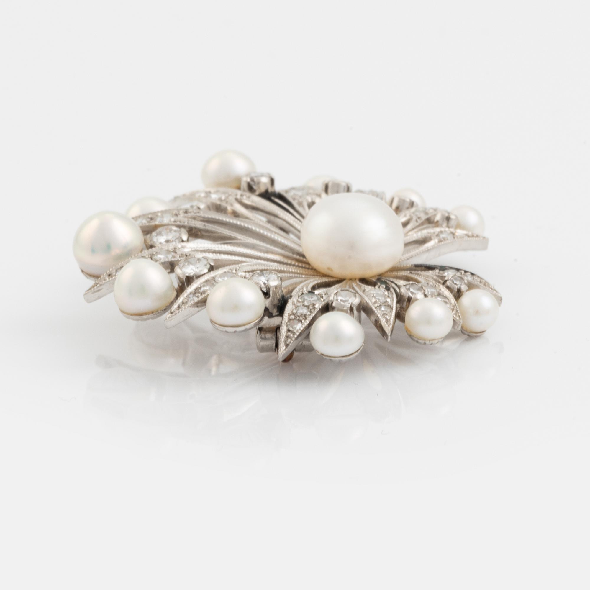 A A Tillander demi-parure suite.