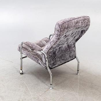 A lste 20th century easy chair.
