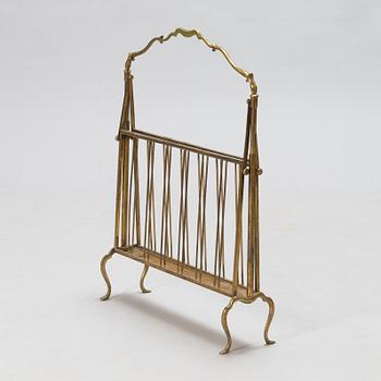 A folding brass magazine stand, first half of the 20th century.