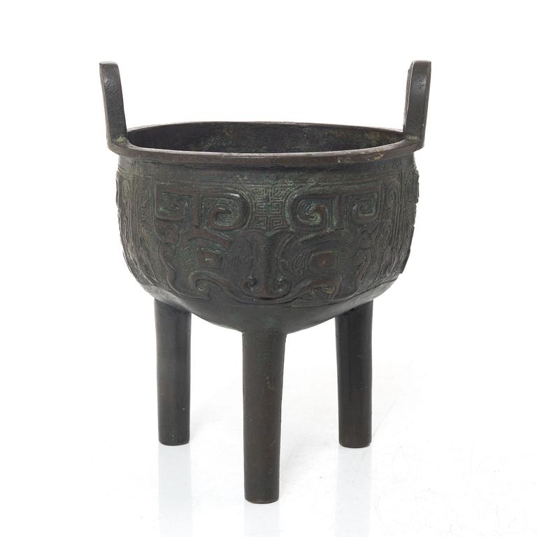 A Chinese tripod bronze censer, Ming style, Qing dynasty (1644-1912).